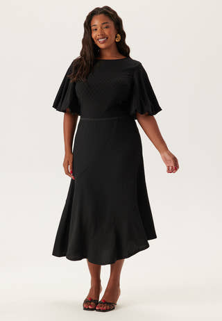Structured Asymmetric Skirt