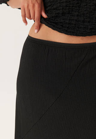Structured Asymmetric Skirt